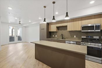 Modern kitchen with a large island and stainless steel appliances1